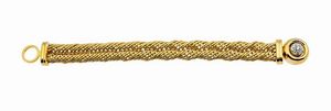 POMELLATO - Peso gr 108 1 Lunghezza cm 19 Bracciale in oro giallo  lavorato a maglia groumette composta da anelli. Chiusura  [..]