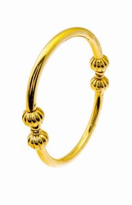 POMELLATO - Peso gr 38 9 Bracciale rigido  in oro giallo  firmato Pomellato  decorato con quattro sfere fesonate; interno  [..]