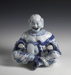 MANIFATTURA DI DELFT DEL XVIII SECOLO - Rara statuetta di Magot sorridente in porcellana bianco blu