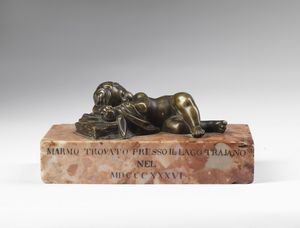MANIFATTURA ITALIANA DEL XIX SECOLO - Putto dormiente in bronzo.