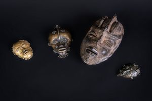 Arte africana - Quattro maschere in metallo Africa sub Sahariana