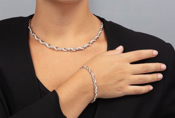 Demi-parure composta da collana e bracciale con diamanti  - Asta Gioielli - Asta a Tempo - Associazione Nazionale - Case d'Asta italiane