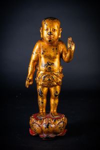 Arte Cinese - Scultura in ferro laccato e dorato raffigurante buddha bambino Cina, dinastia Ming, XVI secolo