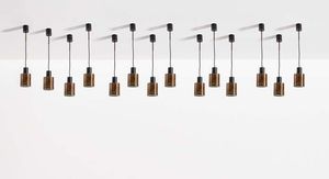 STILNOVO - Quattrodici lampade a sospensione in metallo color rame e metallo verniciato. Anni '50 altezza regolabile  diffusori  [..]