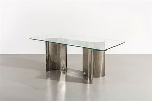 VITTORIO INTROINI - Tavolo con supporto centrale in acciaio cromato  piano in vetro molato. Anni '70 cm 73 5x186x90
