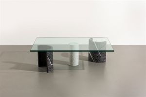 MAURIZIO CASIGLIANI - Tavolino in blocchi di marmo tornito. Prod. Casigliani anni '70 cm 34x118 5x79