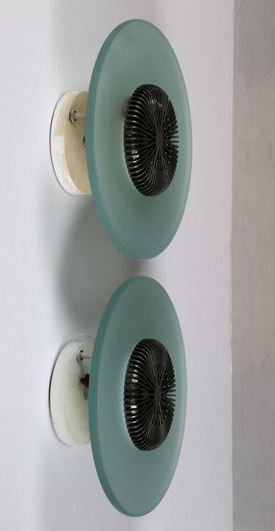 CINI & NILS : Coppia di lampade da parete, modello Aureola Halo, anni '80. (2)  - Asta ASTA 291 - DESIGN (online) - Associazione Nazionale - Case d'Asta italiane