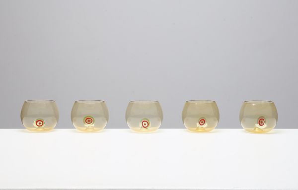 POTENZA GIANMARIA (n. 1936) : Bicchieri in vetro trasparente color ambra decorati con una murrina color arancio. Mod. S 248, anni 60.  - Asta ASTA 295 - DESIGN (Banditore Virtuale) - Associazione Nazionale - Case d'Asta italiane