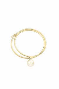 GIROCOLLO-BRACCIALE - Peso gr 15.3 Particolare gioiello composto da girocollo in oro giallo con al centro una perla australiana del  [..]