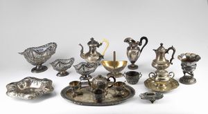 MANIFATTURA ITALIANA DEL XIX-XX SECOLO - Gruppo di 18 oggetti in argento di varie epoche.