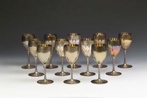 ARGENTIERE DEL XX SECOLO - Set di 12 bicchieri da champagne in argento.