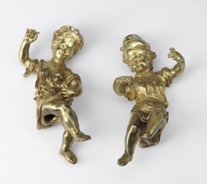 MANIFATTURA DEL XIX SECOLO - Coppia di figure in bronzo dorato.
