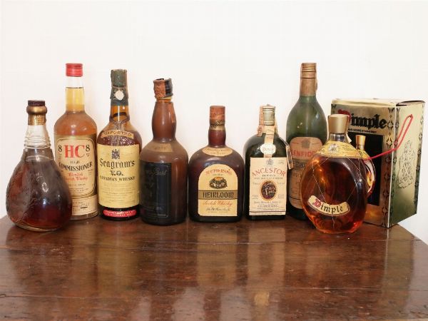 Otto bottilgie di scotch whisky  - Asta La dimora del Collezionista - Villa delle Azalee a Firenze - IV - Associazione Nazionale - Case d'Asta italiane