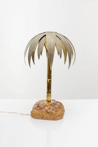PRODUZIONE ITALIANA - Lampada da tavolo raffigurante una palma su roccia in metallo verniciato. Anni '50 h cm 53