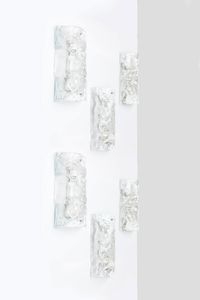 MAZZEGA - Sei lampade da parete in vetro trasparente e vetro lattimo di forte spessore  montatura in metallo verniciato.  [..]