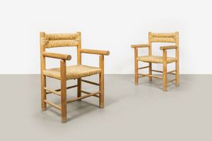 PRODUZIONE ITALIANA - Due poltrone con struttura in legno chiaro  sedute in paglia intrecciata. Anni '40 cm 86 5x53x55