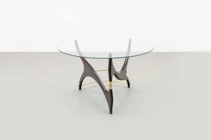 PRODUZIONE ITALIANA - Tavolino con struttura in legno di mogano  particolari in ottone  piano in vetro molato. Anni '50 cm 47x74