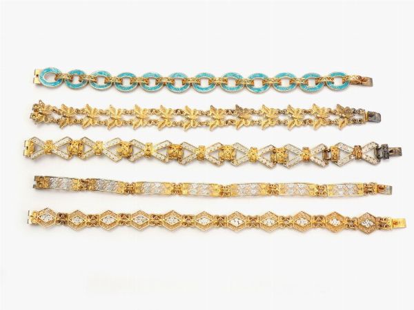 Nove bracciali in argento 800/1000 e smalti policromi  - Asta Gioielli, Orologi e Monete d'Oro - Associazione Nazionale - Case d'Asta italiane