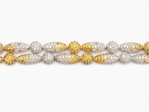 Bracciale in oro bianco con diamanti e zaffiri gialli  - Asta Gioielli, Orologi e Monete d'Oro - Associazione Nazionale - Case d'Asta italiane