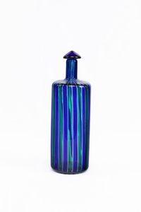VENINI - H cm 29 Bottiglia con tappo in vetro con face blu e verdi; marcato Venini '94. Doppia etichetta Venini cartace [..]