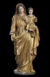 ARTISTA ITALIANO DEL XVII SECOLO - Madonna con Bambino in legno dorato policromo.