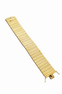 BRACCIALE - Peso gr 54 8 Lunghezza cm 19 in oro giallo  anni '40  con segmenti lisci verticali