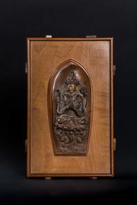 Arte Himalayana - Frammento in bronzo a patina bruna raffigurante ChenrezigCino/Tibet, fine XVIII secolo