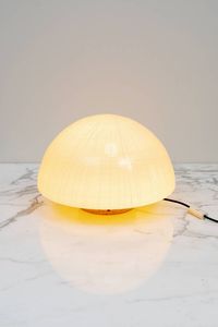 MANIFATTURA MURANESE - Lampada da tavolo in travertino e vetro. Anni '70 h cm 31