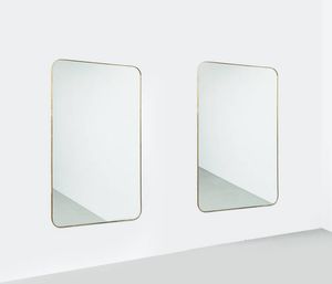 PRODUZIONE ITALIANA - Coppia di grandi specchiere con bordo in ottone. Anni '50 cm 180x110