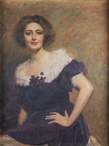 CARLO GAUDINA Torino 1878 - 1937 - Ritratto di Giovane donna con viole del pensiero 1922