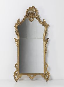 MANIFATTURA VENEZIANA DEL XIX SECOLO - Specchiera in legno dorato nello stile del XVIII secolo.