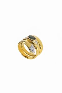 CHEVALIER - Peso gr 13 7 Misura 5 (45) in oro giallo  a serpente  con zaffiro centrale taglio ovale  di ct 0 70 ca e piccoli  [..]