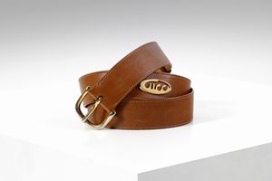 GUCCI - Cintura in pelle color cuoio con fibbia oro. Fine anni 80.