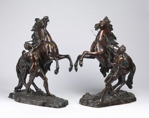 BRONZISTA DEL XIX-XX SECOLO - Coppia di sculture dei Cavalli di Marly dal modello di Guillaume Coustou.