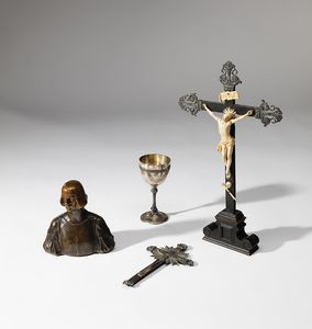 MANIFATTURA ITALIANA - Crocefisso in avorio, busto in bronzo in stile neorinascimentale, piccolo calice in argento, crocefisso in rame argentato.