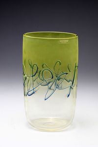 BARBINI ALFREDO (1912 - 2007) - Vaso in giallo acido sfumato in trasparente e decoro in rilievo a caldo