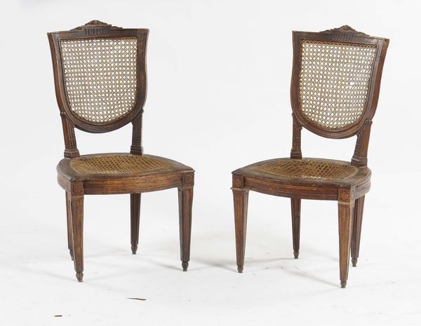 Due sedie in stile Luigi XVI in noce, XIX secolo  - Asta Arredi | Cambi Time - Associazione Nazionale - Case d'Asta italiane