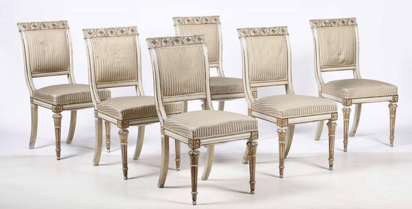 Tavolo e sei sedie in legno intagliato, dipinto, laccato e dorato  - Asta Arredi | Cambi Time - Associazione Nazionale - Case d'Asta italiane