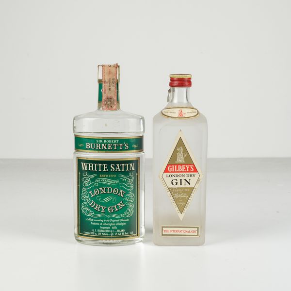 Gilbey's, London Dry Gin Burnett's White Satin, London Dry Gin  - Asta Heritage. Vini e Distillati da Collezione - Associazione Nazionale - Case d'Asta italiane