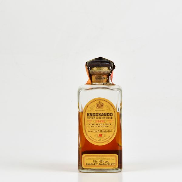 Knockando, Justerini & Brooks, Fine Single Malt Scotch Whisky Extra Old Reserve  - Asta Heritage. Vini e Distillati da Collezione - Associazione Nazionale - Case d'Asta italiane