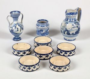 MANIFATTURA DI ALBISSOLA - Gruppo di nove oggetti in ceramica smaltata e dipinta.
