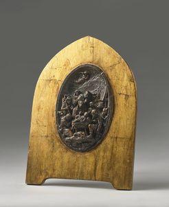 ARTISTA DELL'ITALIA SETTENTRIONALE DEL XVIII SECOLO - Pannello ovale in legno intagliato a bassorilievo raffigurante Sacra famiglia con l'adorazione dei pastori.