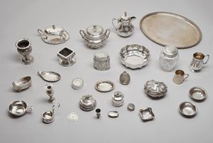 ARGENTIERE DEL XX SECOLO - Gruppo di 29 oggetti in argento.