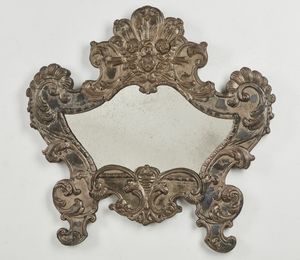 MANIFATTURA DEL XVIII SECOLO - Cartagloria in rame argentato su legno adattata a specchio.