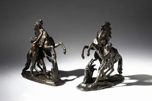 BRONZISTA DEL XIX SECOLO - Coppia di sculture dei Cavalli di Marly dal modello di Guillaume Coustou.