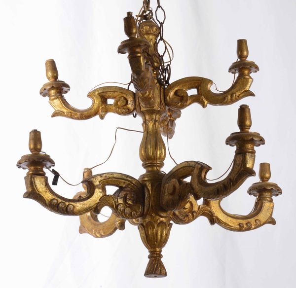 Lampadario a otto luci in legno dorato  - Asta Antiquariato | Cambi Time - Associazione Nazionale - Case d'Asta italiane