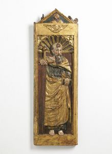 SCULTORE DELL'ITALIA SETTENTRIONALE DEL XVI SECOLO - Pannello in legno policromo e parzialmente dorato scolpito a bassorilievo raffigurante S.Paolo.