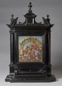 MANIFATTURA ROMANA DEL XVII SECOLO - Orologio notturno in legno ebanizzato con quadrante dipinto con Allegoria del Tempo.
