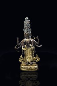 STATUA - Figura di Ekadasamukha-Avalokitesvara in bronzo dorato  Tibet  XVIII secolo. h cm 36