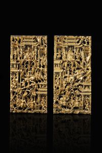 COPPIA DI PANNELLI - Coppia di pannelli in legno dorato intarsiati  Cina  Repubblica  XX secolo. h cm 53 5x25 5